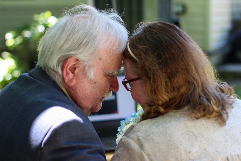 Harrison 50th anniversary — fifty years, foreheads together
