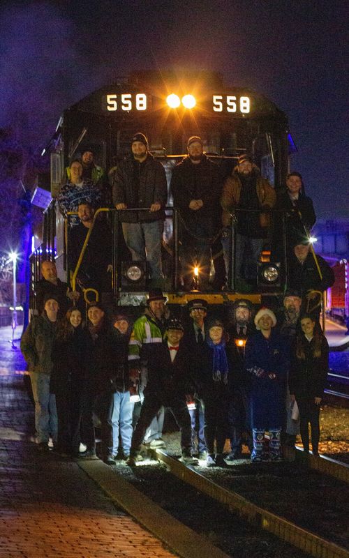 Behind the scenes — cast and crew on the locomotive at night, Polar Express live production