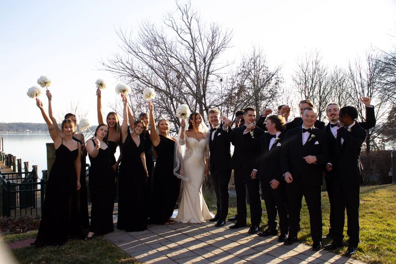 The Riemer wedding — the full wedding party celebrates