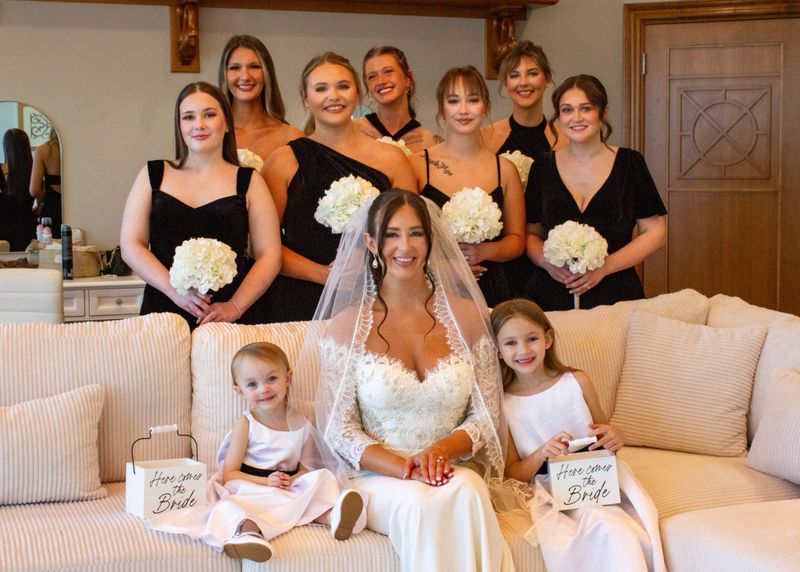 The Riemer wedding — the bride with her party and flower girls