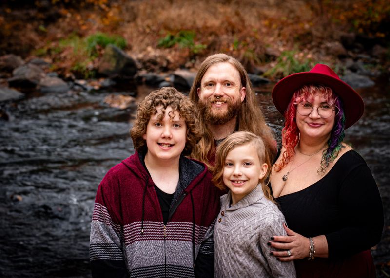 The Cochrine family — family portrait at the stream