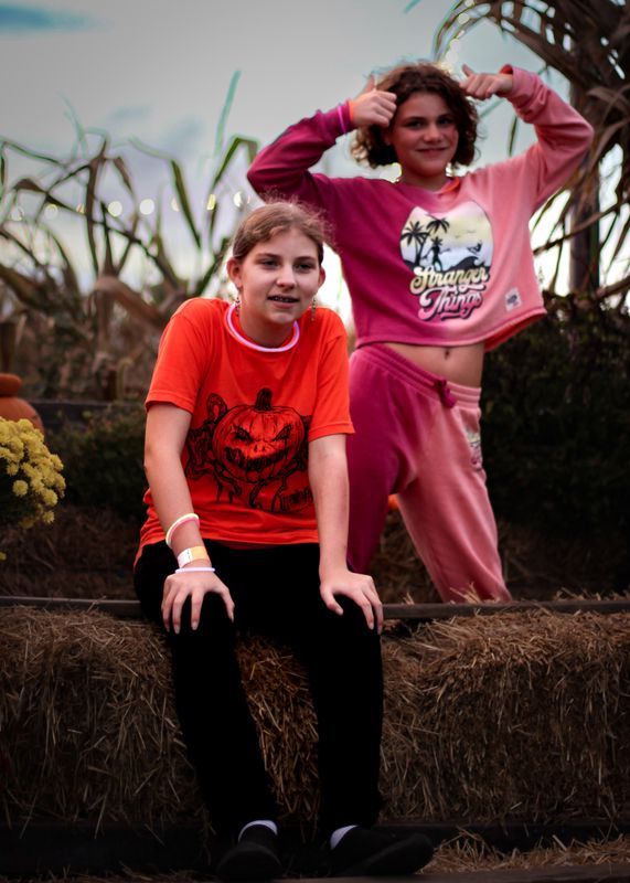 Fall family night — the kids on the hay bales