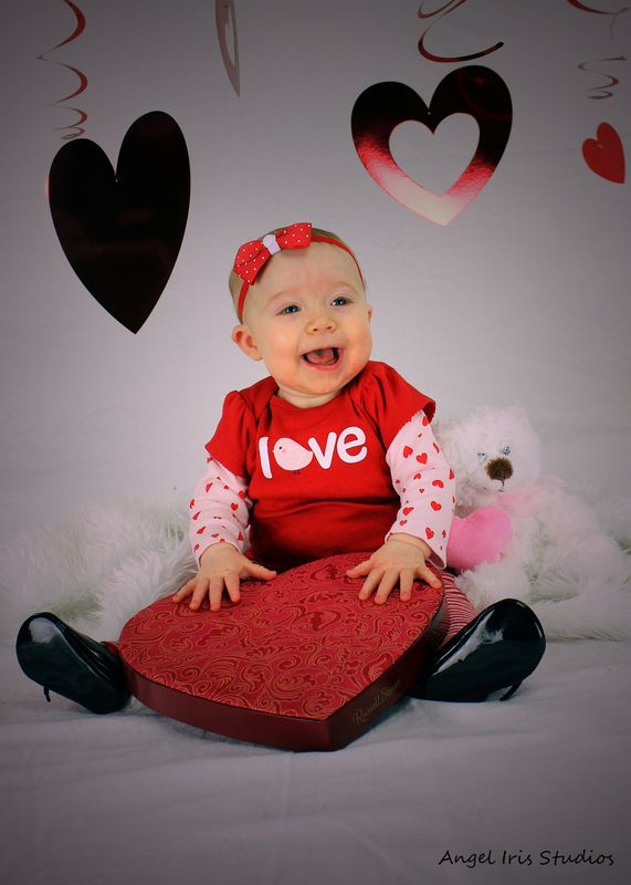 Paisley's Valentine session — sitting with the heart box (as Angel Iris)